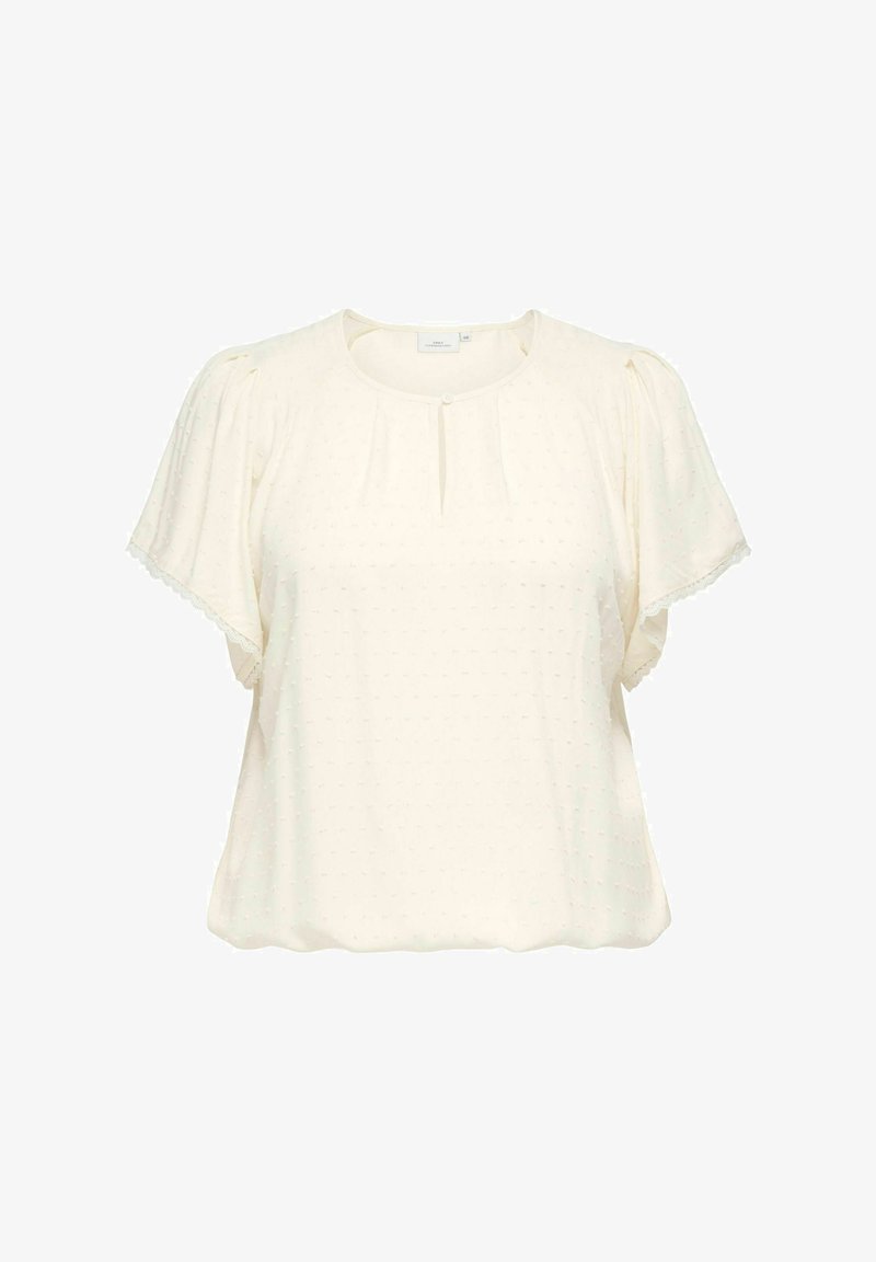 Blouse crème à manches courtes avec texture subtile à pois, encolure ronde avec petite ouverture et bouton, et bords de manches ornés de dentelle.