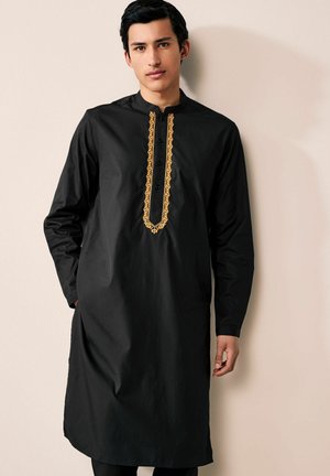 Black long-sleeve kurta made of cotton, featuring a high collar and intricate gold embroidery along the placket, with a relaxed fit.
