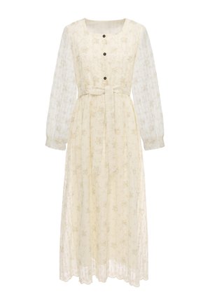 Langes transparentes cremefarbenes Kleid mit dezentem Blumenmuster, langen Puffärmeln, drei schwarzen Knöpfen vorne und einem passenden Stoffgürtel in der Taille.