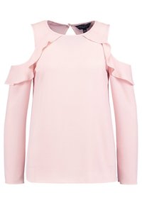 Top rosa a maniche lunghe con aperture sulle spalle, caratterizzato da dettagli arricciati lungo il colletto e le spalle. Tessuto liscio. Chiusura sul retro.