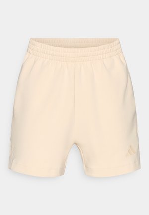 Beige sportieve korte broek met een elastische tailleband, een gladde textuur en zijzakken. Voorzien van een subtiel geperst logo aan de onderkant van het linkerbeen.