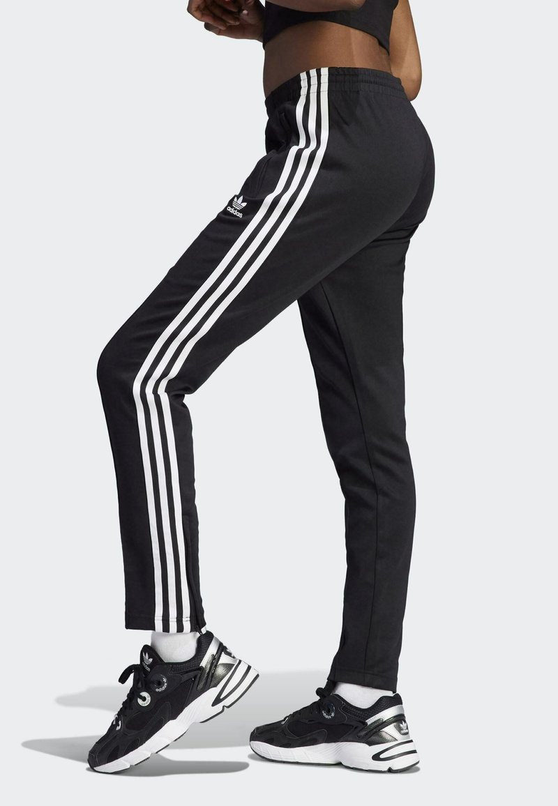 adidas Originals SUPERSTAR SUPER GIRL ADICOLOR TRACK PANTS - Spodnie  treningowe - black/white - Zalando.pl