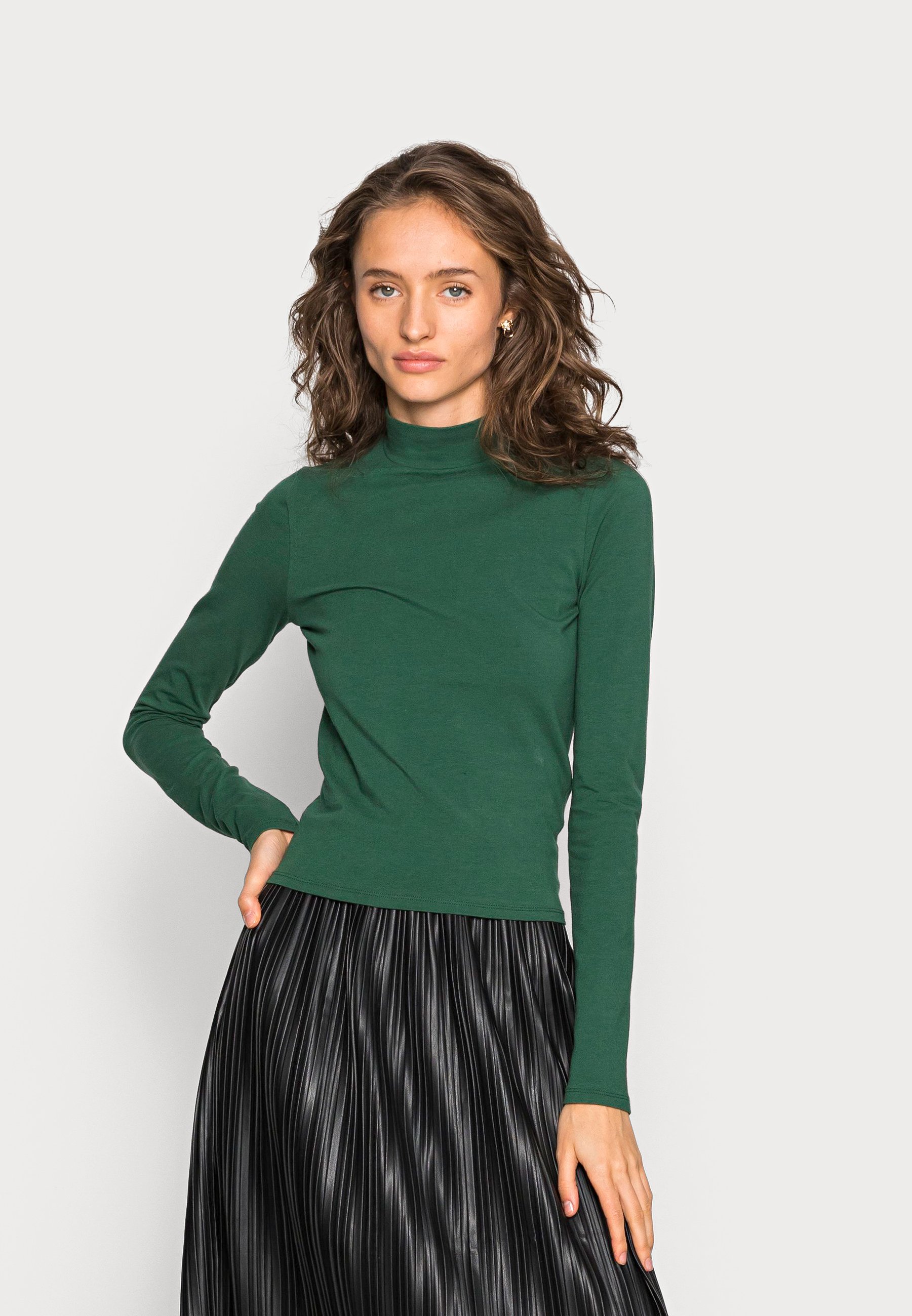 dark green mock neck top