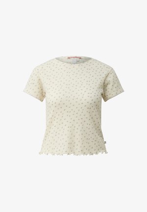 Cream short-sleeve ribbed knit top with small brown floral print and lettuce-edge hem, shown on a plain white background.