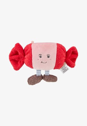 Soft red and pink candy-shaped plush toy with a smiling face, striped legs, and brown feet on a white background.