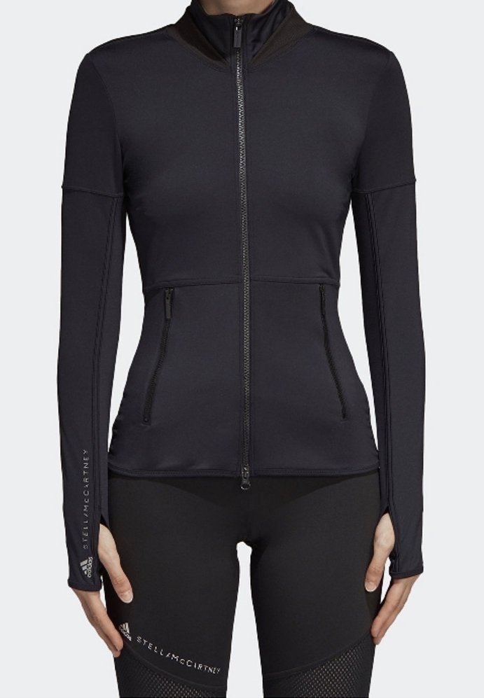 Černá sportovní bunda s vysokým límcem, dlouhými rukávy, předním zipem a dvěma kapsami na zip. Vyrobena z hladkého, elastického materiálu.