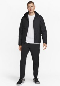Nike Performance UNLIMITED - Jakna za nošenje na otvorenom - black black