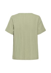 Top a maniche corte in tessuto verde chiaro con strisce texture. Forma boxy e scollatura arrotondata, caratterizzato da un design semplice e pulito.