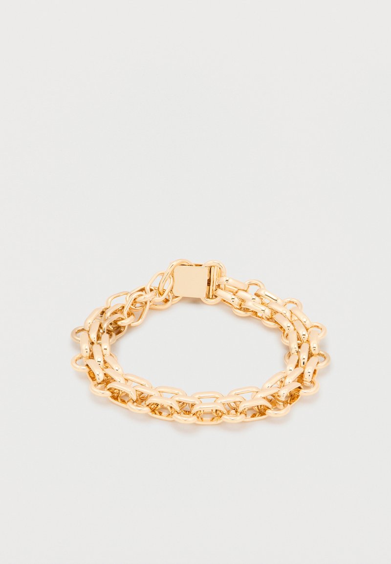 Kuldse tooniga metallist käevõru, millel on omavahel seotud ketielemendid, poleeritud viimistlus ja turvaliseks kandmiseks klambriga sulgur.