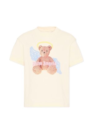 Crèmekleurig T-shirt met een afbeelding van een teddybeer met een gele halo en blauwe engelenvleugels, met de tekst "Palm Angels".