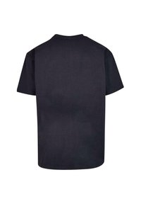 Sort bomulds T-shirt med korte ærmer, rund halsudskæring og lige pasform. Glat tekstur uden synlige mønstre eller detaljer.