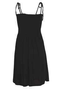 Svart klänning med smockad bodice, justerbara band och en svängande kjol med subtila veck. Slät, lättviktig tyg.