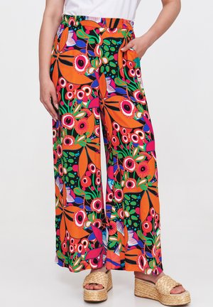 Colorful, wide-leg trousers featuring a vibrant floral print with red, pink, orange, and green hues; lightweight fabric and elastic waistband.