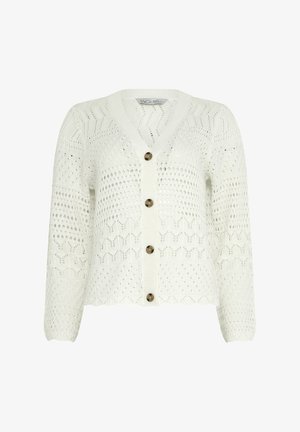 Cardigan en tricot blanc avec motifs en chevrons texturés et points, quatre boutons marron, et ourlet et poignets festonnés.