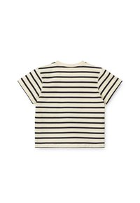 Striped t-shirt featuring black horizontal stripes on a cream background, short sleeves, and a crew neck design. Smooth, cotton material.