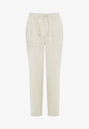 Pantalones jogger de color beige claro, confeccionados en una tela suave, con cintura elástica, cordón y dos grandes bolsillos laterales.