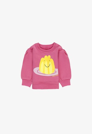 Felpa rosa con maniche a sbuffo, con un design di un personaggio di gelatina gialla su un piatto tondo. Realizzata in morbido cotone.