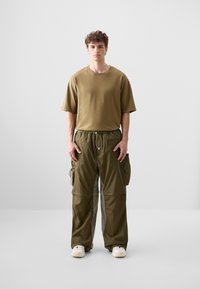 Oakley - LATITUDE FLIGHT PANT - Pantaloni outdoor - army green Imagine miniatură 1