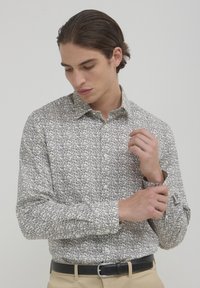Calliope À MOTIFS FLORAUX - Camicia - une variante