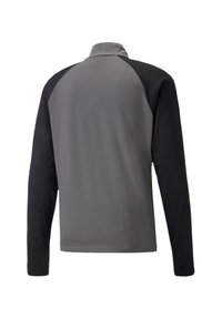 Langärmlige Jacke mit grauem Oberkörper und schwarzen Ärmeln. Verfügt über einen hohen Kragen und eine glatte Textur. Schlichtes Design ohne sichtbare Hardware.