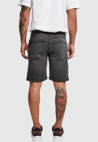 Urban Classics Kratke hlače od trapera - real black washed