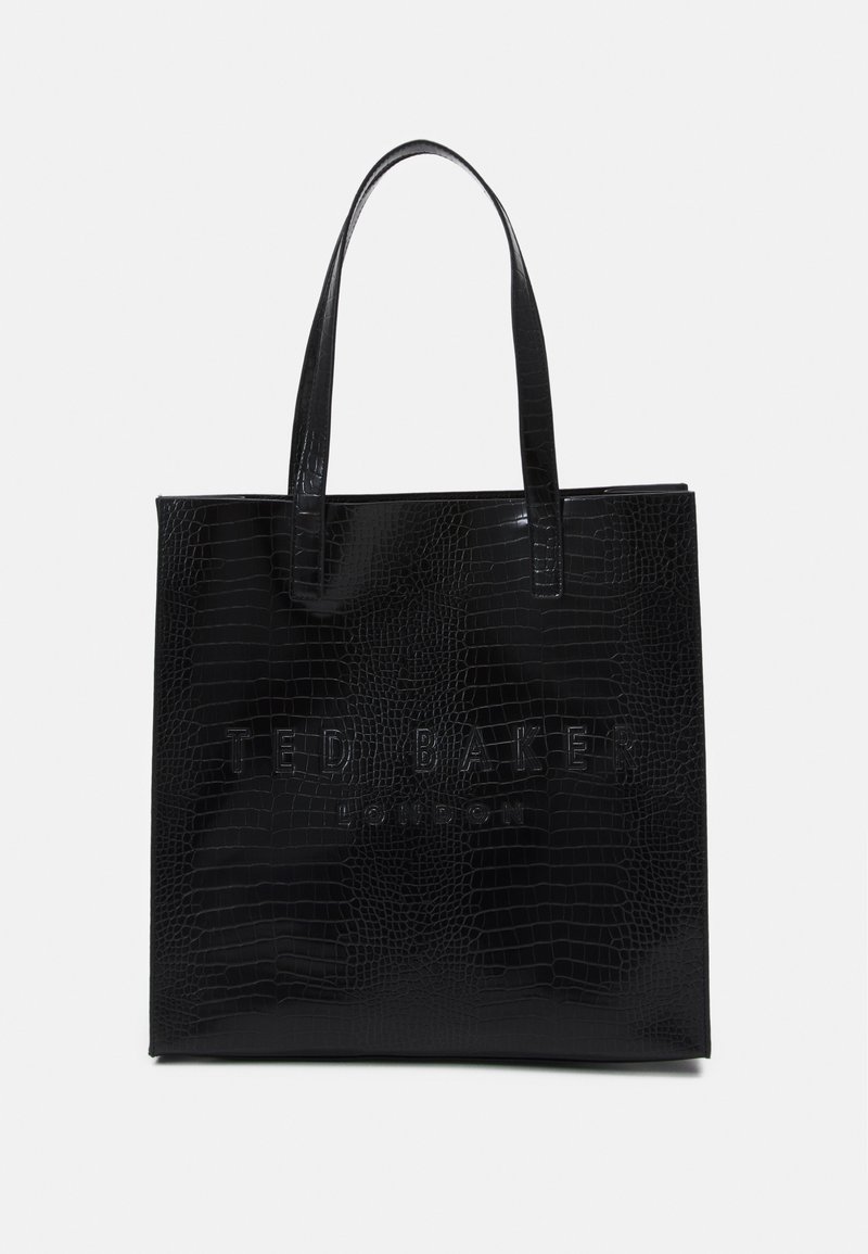 Black tote bag made of glossy faux crocodile leather, featuring two sturdy handles and embossed "TED BAKER LONDON" logo on the front.