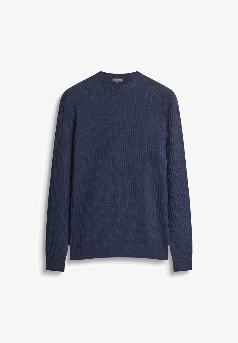Maglione a maniche lunghe di colore blu navy, realizzato in maglia con un motivo zigzag testurizzato e polsini e orlo a coste.
