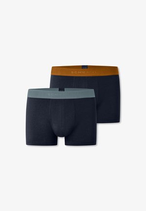 Dark blue boxer shorts with light blue and brown elastic waistbands. Soft, smooth fabric with no visible patterns or accents.