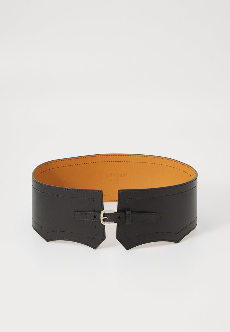 Black leather belt with a wide design, featuring a tan inner lining, buckle detail, and decorative stitching along the edges.
