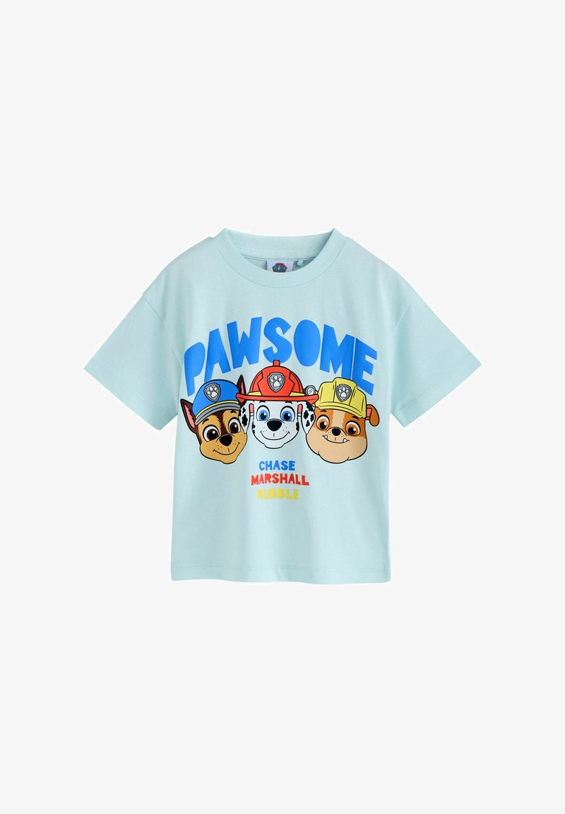 Chemise bleu clair pour enfants avec les personnages Chase, Marshall et Rubble de Paw Patrol, avec le mot « PAWSOME » en bleu au-dessus d'eux.