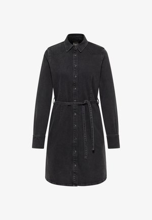 Zwarte denim jurk met lange mouwen, knoopsluiting aan de voorkant, een spitse kraag en een strikceintuur. Voorzien van lichte stikselaccenten.