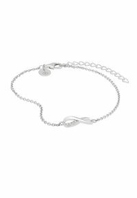 Pulsera delicada de cadena de plata con un adorno central de símbolo de infinito decorado con pequeños cristales y un cierre ajustable.