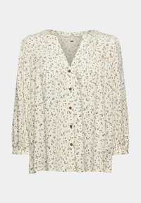 Blouse crème à manches longues avec petit imprimé floral multicolore et boutons marron sur le devant, coupe ample, col en V.