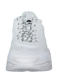 White athletic shoe with a mesh upper, textured detailing, and contrasting black and white laces. Thick rubber sole with traction pattern.