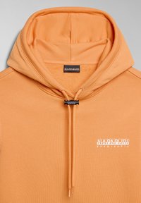 Sweat à capuche orange avec cordons à l'avant et petit logo blanc Napapijri Geographic sur la poitrine.
