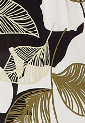 Floral fabric featuring large, black and white leaves with gold outlines and textured details, set against a cream background.
