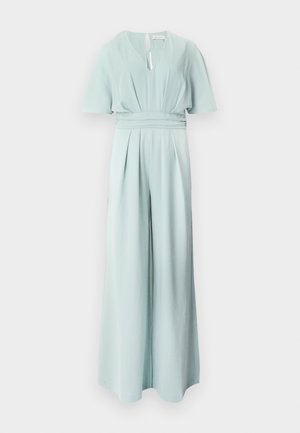 Lichtblauwe jumpsuit met wijde pijpen, korte mouwen, V-hals met split en een getailleerde tailleband met plooien.