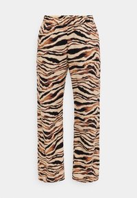 Pantalon à jambes larges en tissu léger, avec un motif à rayures tigre dans des tons de beige, noir et marron, doté d'une ceinture élastique.