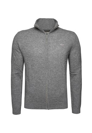 Grå zip-up tröja med hög krage, tillverkad av mjukt material, med långa ärmar och subtil logotypdetalj på bröstet.