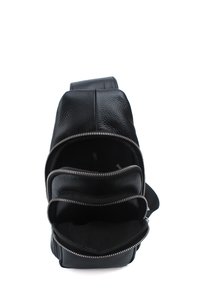 Black leather bag with three zippered compartments, smooth texture, and a structured design. Adjustable strap for crossbody or shoulder wear.