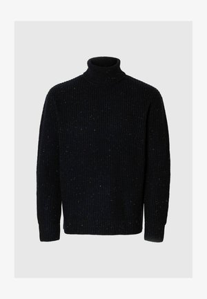 Kootud must kõrge kaelusega sviiter ribatekstuuriga ja mitmevärviliste täppidega. Pikad varrukad ja mugav istuvus.