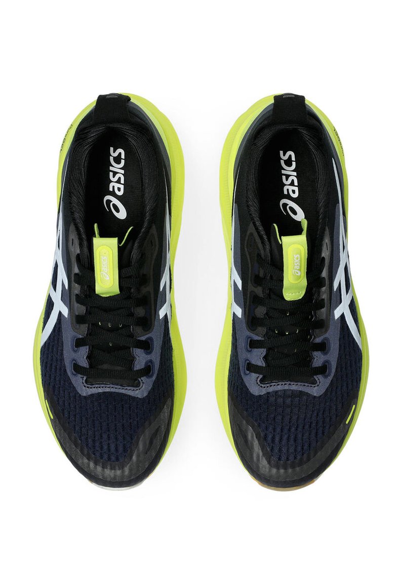 Black and yellow athletic shoes with a textured mesh upper, streamlined design, and laces. Features reflective accents and cushioned sole.