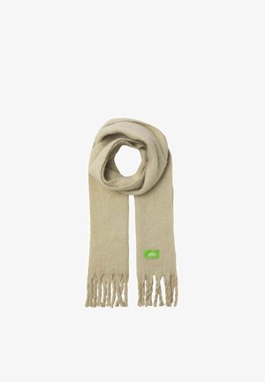 Beige scarf made of soft material, featuring a thick design, frayed ends, and a small green label with "JJXX" on one side.