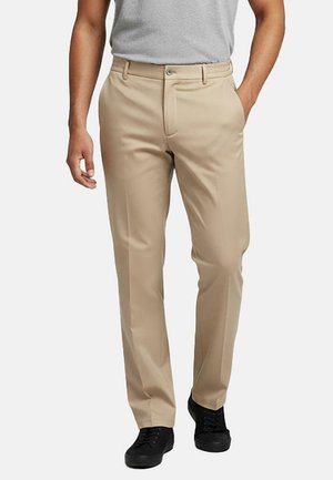Beige broek van gladde stof met een rechtvallende pasvorm. Beschikt over een knoop- en ritssluiting, voorzakken en minimale stiksels.