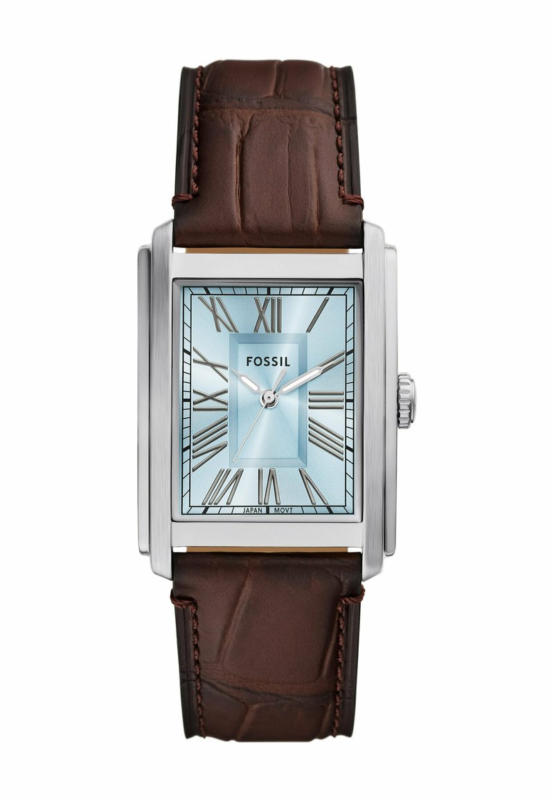 Fossil rectangular watch with a silver case, light blue dial, and Roman numerals. Brown textured leather strap with contrasting stitching.