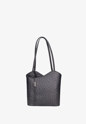 Sac à main noir en texture avec deux longues sangles, comportant une poche latérale zippée et un design ondulé sur le bord supérieur. Fabriqué en matériau synthétique.