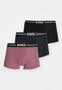 Three pairs of boxer briefs in dark blue, black, and pink, featuring logoed elastic waistbands and a fitted design in a smooth fabric.