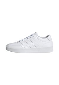 White athletic shoes with smooth synthetic material, round toe, flat rubber sole, and three parallel side stripes. Lace-up design.