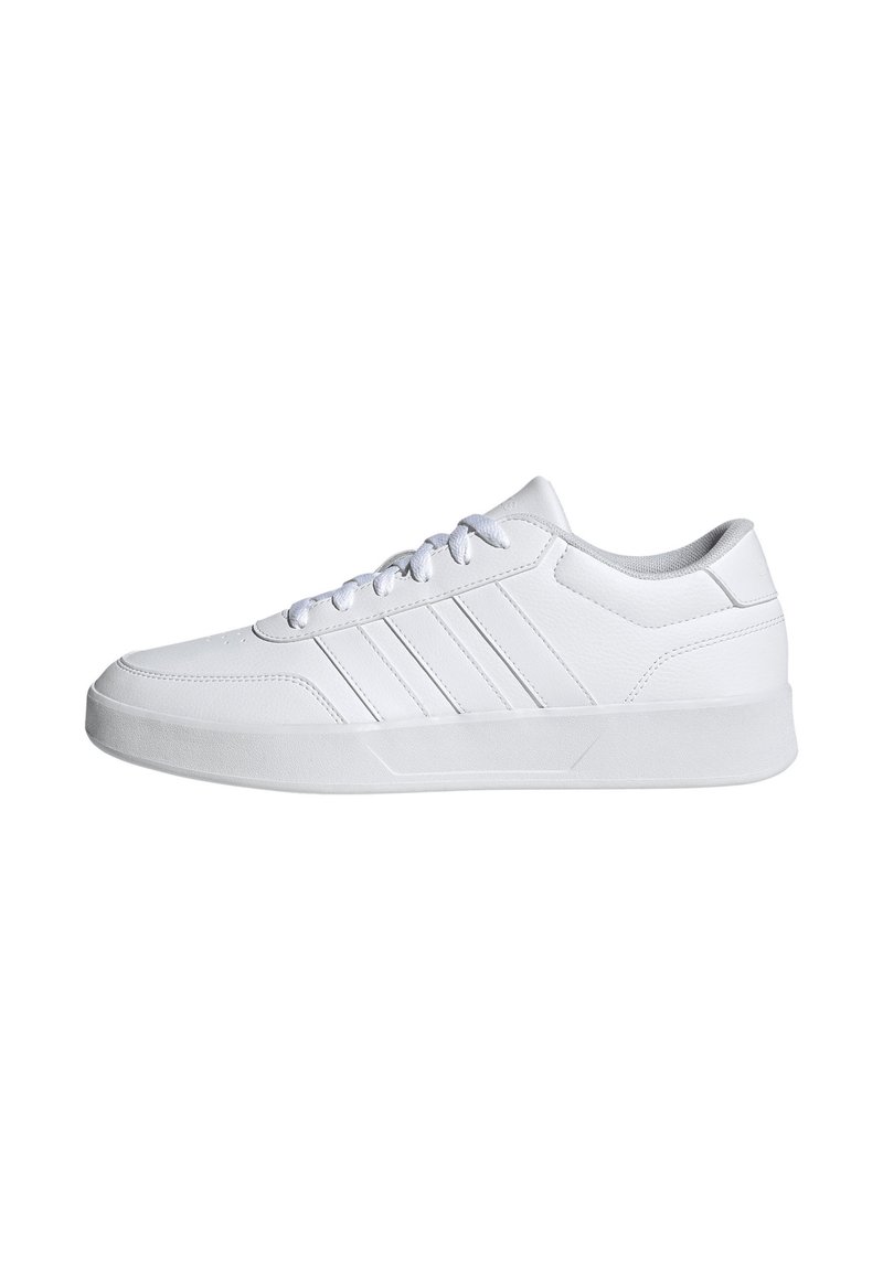 White athletic shoes with smooth synthetic material, round toe, flat rubber sole, and three parallel side stripes. Lace-up design.