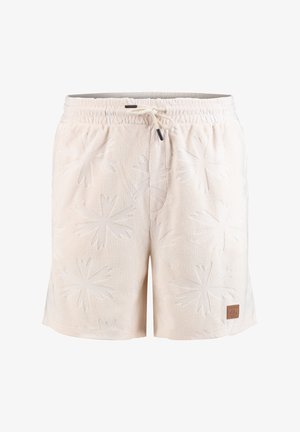 Shorts en tissu éponge couleur crème avec motifs floraux en relief, taille élastique, cordon de serrage et un petit patch logo marron sur la jambe.